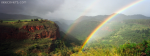 Rainbow And Mountains Scene After Rain